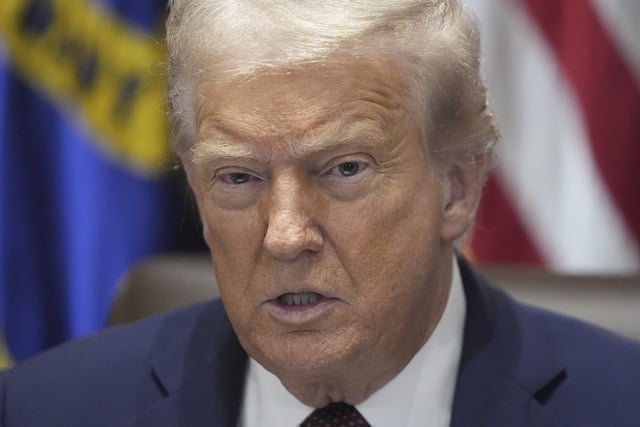 President Donald Trump speaks during a cabinet meeting, Tuesday, Aug. 26, 2025, at the White House in Washington. (AP Photo/Mark Schiefelbein)