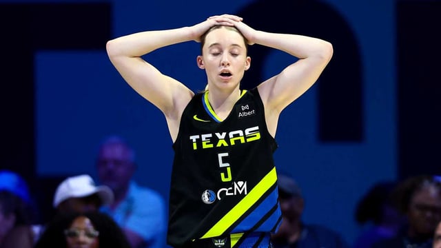 Aug 24, 2025; Arlington, Texas, USA; Dallas Wings guard Paige Bueckers (5) reacts during the second half against the Golden State Valkyries at College Park Center. Mandatory Credit: Kevin Jairaj-Imagn Images