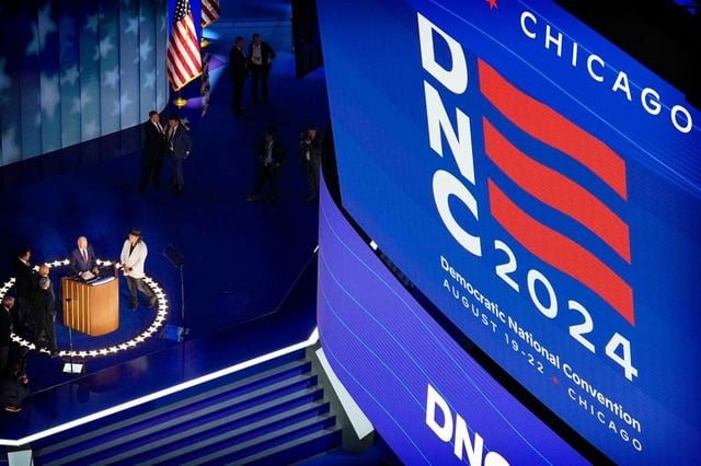 President Biden looks over the hall before the Democratic National Convention Monday, Aug. 19, 2024, in Chicago. (AP Photo/James Lipari)