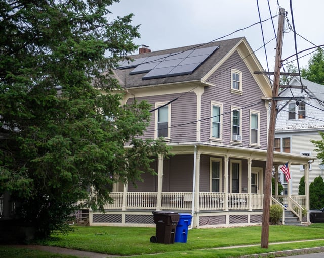 Solar panels are on a home in a Middletown neighborhood. A federal tax credit for homeowners is ending on Dec. 31.  (Aaron Flaum/Hartford Courant)