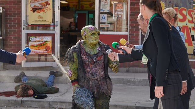 While Peter Dinklage plays Toxie pre-transformation, stunt performer Luisa Guerreiro (center) is the one under the foam and prosthetics in "The Toxic Avenger."