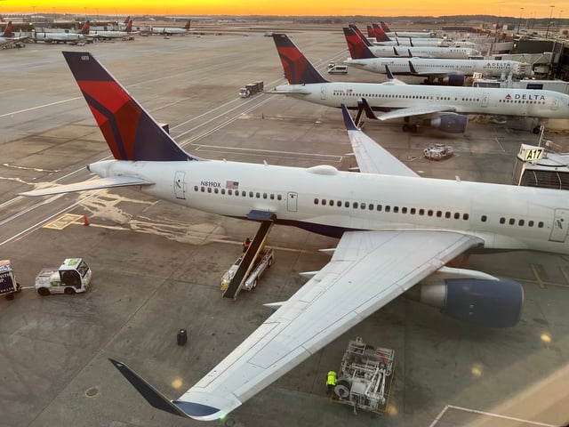 Delta planes sit at gates at Hartsfield-Jackson Atlanta International Airport on Dec. 8, 2024.