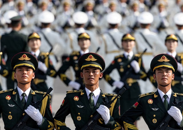 Soldiers of the People's Liberation Army (PLA) of China attend a training ahead of a military parade to mark the 80th anniversary of the end of World War Two, in Beijing, China, August 20, 2025. (REUTERS/Maxim Shemetov/File Photo)