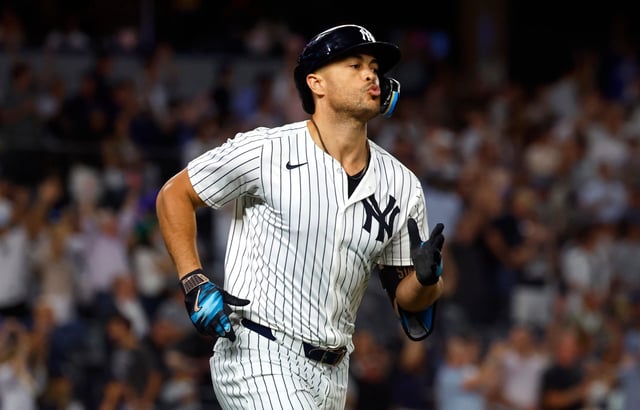 New York Yankees' Giancarlo Stanton runs the bases after hitting a two run home run during the sixth inning of a baseball game against the Washington Nationals, Tuesday, Aug. 26, 2025, in New York. (AP Photo/Noah K. Murray)