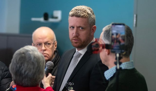 Liberal MLA Iain Rankin answers questions from reporters following a news conference at the downtown Halifax office of Auditor General Kim Adair in February.