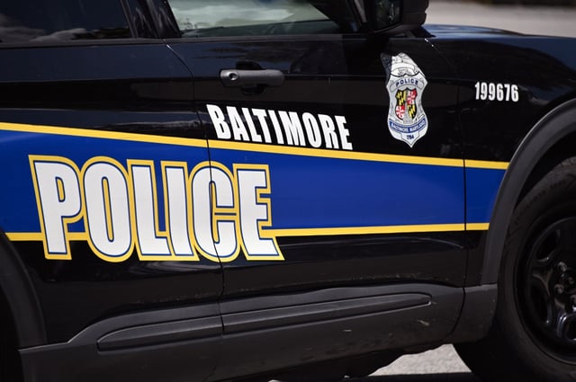 Investigators are on the scene in Cherry Hill where a Baltimore Police officer and a security guard exchanged gunfire Wednesday with the suspect in a separate shooting.