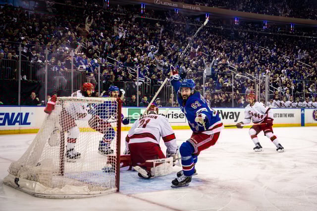 Mika Zibanejad of the New York Rangers celebrates after scoring a goal during the first period against the Carolina Hurricanes in Game One of the Second Round of the 2024 Stanley Cup Playoffs (Photo by Josh Lavallee/NHLI via Getty Images)