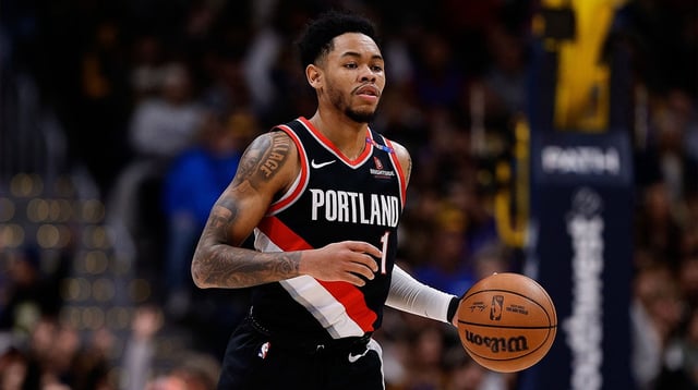 Feb 10, 2025; Denver, Colorado, USA; Portland Trail Blazers guard Anfernee Simons (1) dribbles the ball up court in the second quarter against the Denver Nuggets at Ball Arena. Mandatory Credit: Isaiah J. Downing-Imagn Images