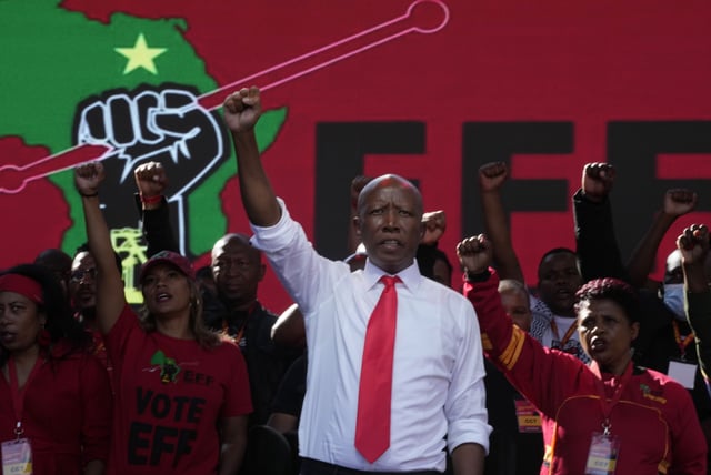 FILE - Economic Freedom Fighters party leader Julius Malema raises his fist at an election rally in Polokwane, South Africa, on May 25, 2024. (AP Photo/Themba Hadebe, File)