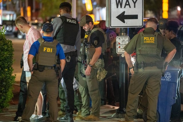 WASHINGTON, DC - AUGUST 10: FBI and Border Patrol officers arrest a man, after he assaulted law enforcement with a sandwich, along the U Street corridor during a federal law enforcement deployment to the nation's capital on August 10, 2025 in Washington, DC. U.S. President Donald Trump ordered an increased presence of federal law enforcement to Washington, DC in an effort to curb crime. (Photo by Andrew Leyden/Getty Images)