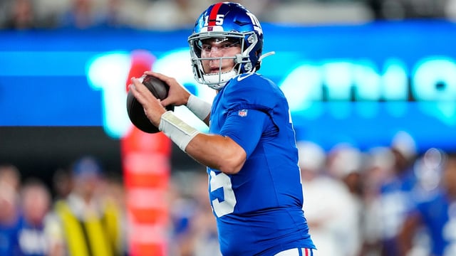 New York Giants quarterback Tommy DeVito (15) gets ready to throw a pass, Thursday, August 21, 2025, in East Rutherford.