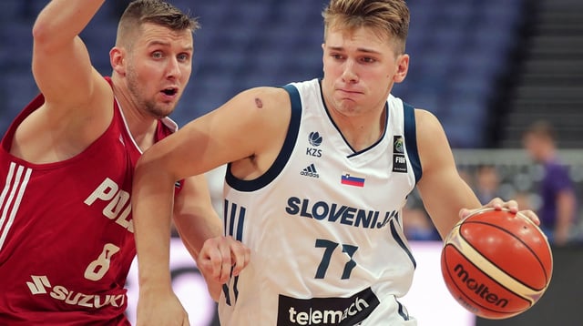 Aug 31, 2017; Helsinki, FINLAND; Poland player Przemyslaw Zamojski (8) defends against Slovenia player Luka Doncic (77) during their FIBA Eurobasket Group A match in Helsinki Arena 31. Mandatory Credit: Matti Matikainen/Newspix24/Sipa USA via USA TODAY NETWORK