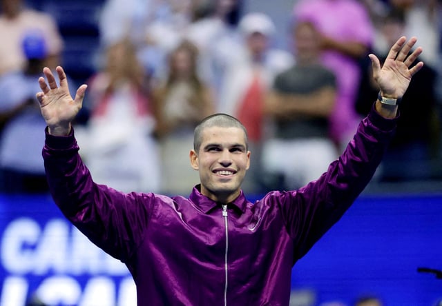 Tennis - U.S. Open - Flushing Meadows, New York, United States - August 26, 2025 Spain's Carlos Alcaraz celebrates after winning his first round match against Reilly Opelka of the U.S. REUTERS/Jeenah Moon