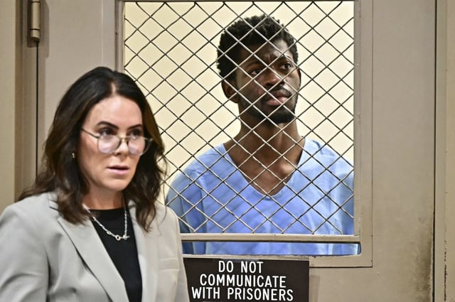Lil Nas X, whose legal name is Montero Lamar Hill, is arraigned in court, next to his lawyer Christy O'Connor, on four felony counts, including three counts of battery with injury on a police officer, on Aug. 25, 2025, in Los Angeles.