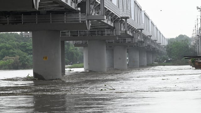 Water level of Yamuna river increasing at Yamuna Bazar near Nigam Bodh Ghat, after large quantity of water is being released every hour from the Wazirabad and Hathnikund barrages, which is pushing the water level up. 
