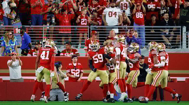 Aug 23, 2025; Santa Clara, California, USA; San Francisco 49ers linebacker Curtis Robinson (59) celebrates with teammates after returning an interception for a touchdown during the fourth quarter against the Los Angeles Chargers at Levi's Stadium. Mandatory Credit: Sergio Estrada-Imagn Images