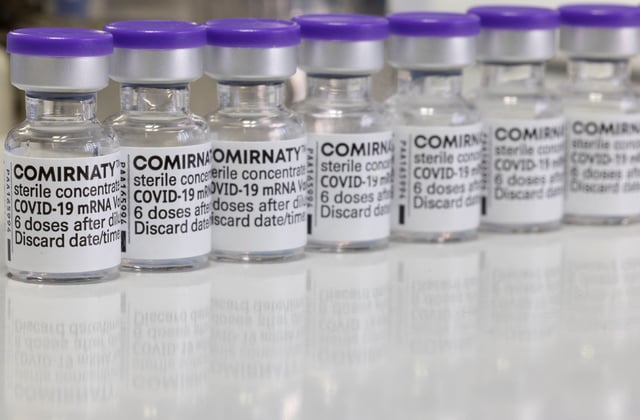 Vials of Biontech-Pfizer's Comirnaty vaccine against COVID-19 are seen during vaccination at the Institute for Health and Food Safety of Zenica, Bosnia and Herzegovina, December 16, 2021. REUTERS/Dado Ruvic/File Photo