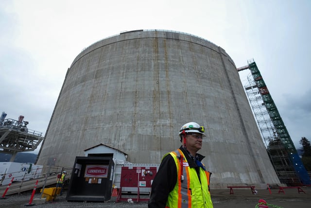 The outside of a massive liquefied natural gas storage tank is seen under construction at the LNG Canada export terminal, in Kitimat, B.C., on Wednesday, September 28, 2022. (Darryl Dyck/The Canadian Press)