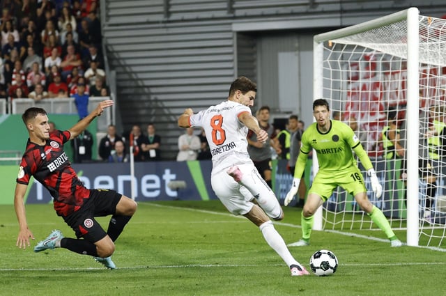 Soccer Football - DFB Cup - Wehen Wiesbaden v Bayern Munich - BRITA-Arena, Wiesbaden, Germany - August 27, 2025 Bayern Munich's Leon Goretzka shoots at goal REUTERS/Heiko Becker