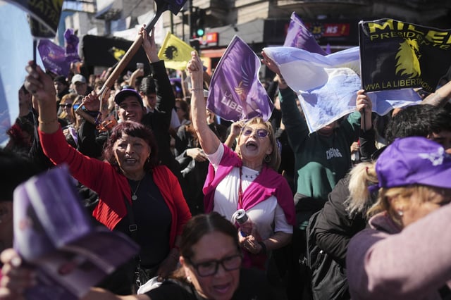 Supporters of Argentine President Javier Milei attend a campaign rally ahead of legislative provincial elections in Lomas de Zamora, Argentina, Wednesday, Aug. 27, 2025. (AP Photo/Natacha Pisarenko)