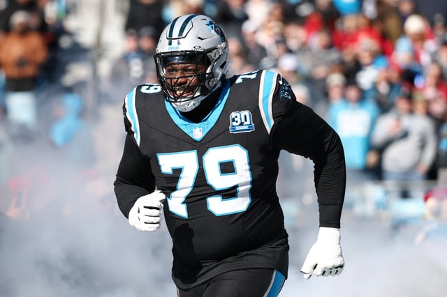 Ikem Ekwonu #79 of the Carolina Panthers is introduced prior to the game against the Arizona Cardinals at Bank of America Stadium on December 22, 2024 in Charlotte, North Carolina.