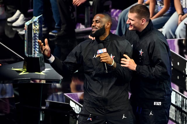 LeBron James of the Los Angeles Lakers and Nikola Jokic of the Denver Nuggets hug prior to the 2023 NBA All Star Game between Team Giannis and Team LeBron at Vivint Arena on February 19, 2023 in Salt Lake City, Utah.