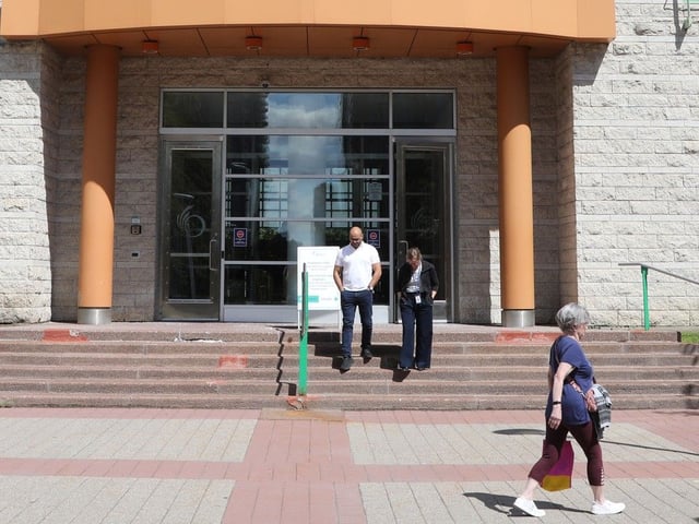 People exit Ottawa City Hall on Aug. 27, the day after the reutrn-to-work mandate was released. 
Jean Levac/Postmedia