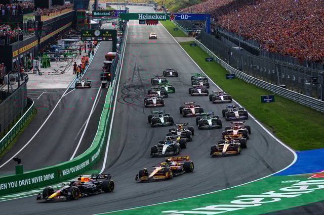 Max Verstappen of the Netherlands driving the (1) Oracle Red Bull Racing RB20 leads the field into the first corner on track during the start of the F1 Grand Prix of Netherlands at Circuit Zandvoort on August 25, 2024 in Zandvoort, Netherlands.
