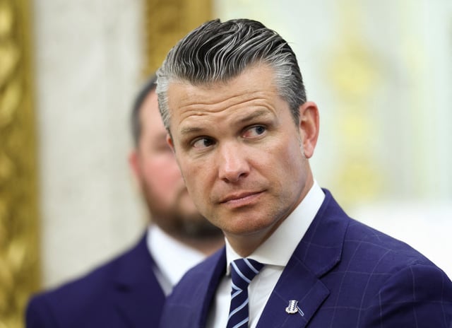 U.S. Defense Secretary Pete Hegseth at the Oval Office of the White House in Washington, D.C., U.S., August 18, 2025. REUTERS/Kevin Lamarque/ File Photo