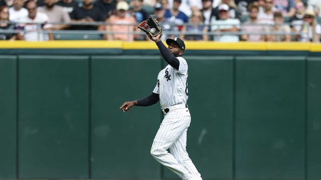 Aug 24, 2025; Chicago, Illinois, USA; Chicago White Sox center fielder Luis Robert Jr. (88) catches a fly ball hit by Minnesota Twins right fielder Kody Clemens during the fifth inning at Rate Field. Mandatory Credit: Kamil Krzaczynski-Imagn Images