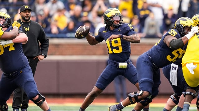 Team Blue quarterback Bryce Underwood (19) makes a pass against Team Maize during the first half of the spring game at Michigan Stadium in Ann Arbor on Saturday, April 19, 2025.