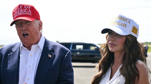 (L/R) US President Donald Trump, alongside Secretary of Homeland Security Kristi Noem, speaks to reporters after arriving at Dade-Collier Training and Transition Airport in Ochopee, Florida, on July 1, 2025. President Trump is visiting a migrant detention center in a reptile-infested Florida swamp dubbed "Alligator Alcatraz." Trump will attend the opening of the 5,000-bed facility -- located at an abandoned airfield in the Everglades wetlands -- part of his expansion of deportations of undocumented migrants, his spokeswoman said. (Photo by ANDREW CABALLERO-REYNOLDS / AFP) (Photo by ANDREW CABALLERO-REYNOLDS/AFP via Getty Images)