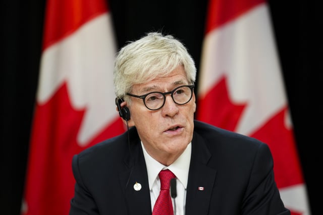 FILE - Tim Hodgson, minister of Energy and Natural Resources, provides an update on the forecast for the 2025 wildfires season at the National Press Theatre in Ottawa on Thursday, June 12, 2025. THE CANADIAN PRESS/Sean Kilpatrick