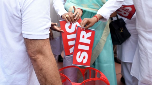Leader of Opposition in Lok Sabha and Congress MP Rahul Gandhi and other INDIA bloc MPs symbolically tear the SIR and throw it in a dustbin during their protest against Special Intensive Revision (SIR) of electoral rolls in Bihar.