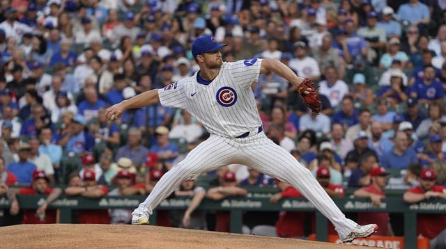 Aug 4, 2025; Chicago, Illinois, USA; Chicago Cubs pitcher Michael Soroka (41) throws the ball against the Cincinnati Reds during the first inning at Wrigley Field. Mandatory Credit: David Banks-Imagn Images