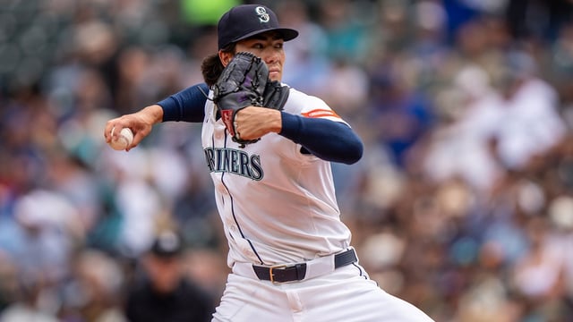 Aug 27, 2025; Seattle, Washington, USA; Seattle Mariners starter Bryan Woo (22) delivers a pitch during the first inning against the San Diego Padres at T-Mobile Park. Mandatory Credit: Stephen Brashear-Imagn Images
