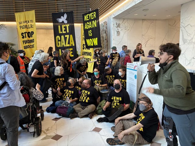 Jewish Bay Area residents stage a sit-in protest at Sen. Alex Padilla’s San Francisco office, calling for a stop to the Israel-Hamas war on Wednesday, Aug. 27, 2025.