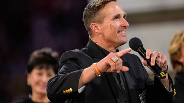 Oct 17, 2024; New Orleans, Louisiana, USA; New Orleans Saints retired quarterback Drew Brees (9) reacts during his hall of fame ceremony at halftime against the Denver Broncos at Caesars Superdome. Mandatory Credit: Matthew Hinton-Imagn Images