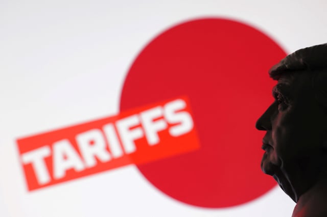 A 3D-printed miniature model of U.S. President Donald Trump, the Japan flag and the word "Tariffs" are seen in this illustration taken July 23, 2025. REUTERS/Dado Ruvic/Illustration/ File Photo