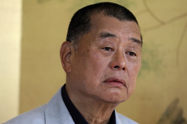 FILE - Hong Kong media tycoon Jimmy Lai pauses during an interview in Hong Kong on July 1, 2020. (AP Photo/Vincent Yu, File)
