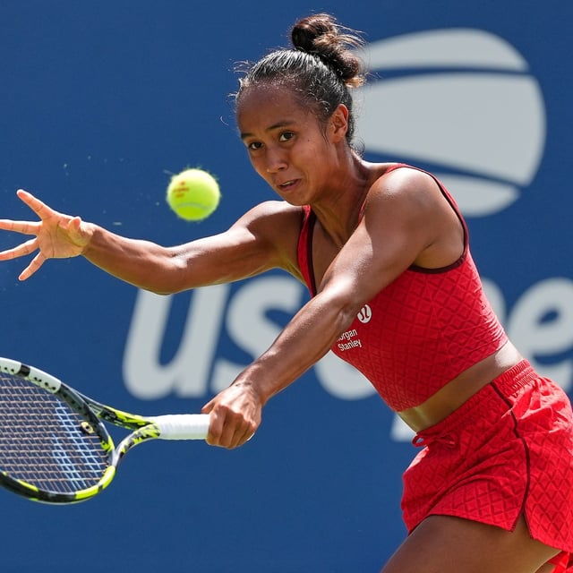 Leylah Fernandez, of Canada, returns a shot to Rebecca Marino, of Canada, during the first round of the US Open tennis championships, Sunday, Aug. 24, 2025, in New York. (AP Photo/Yuki Iwamura)
