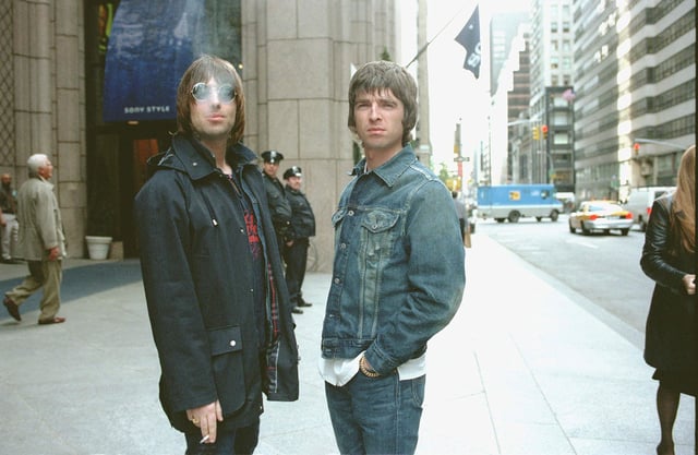 Noel and Liam Gallagher in New York in 2000. The band's history in the US is fraught, but their upcoming shows could define their American legacy.