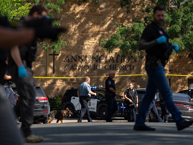 MINNEAPOLIS, MN. - AUGUST 2025: Law enforcement officers search the nearby neighborhood to clear the area after a shooting at Annunciation Church in Minneapolis, Minn. on Wednesday, August 27, 2025. Two children were killed in a shooting Wednesday at Annunciation Church in south Minneapolis, police said, and 17 people were injured, 14 of them children. Two are in critical condition. The suspected shooter, identified as 23-year-old Robin Westman, died of a self-inflicted gunshot wound at the scene, according to police. The shooter attacked while the students were in the first Mass of the school year. (Photo by Alex Kormann/The Minnesota Star Tribune via Getty Images)
ALEX KORMANN • alex.kormann@startribune.com