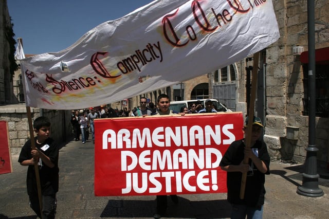 The Armenian community of the Old City of Jerusalem make a protest demanding that the Israeli government recognize the historic mass killings of Armenians under the Ottoman Empire, on April 24, 2005. (Kitra Cahana/ Getty Images)