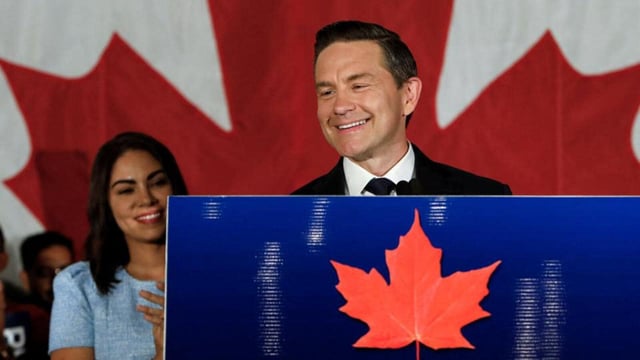 Canada's Conservative leader Pierre Poilievre takes the podium after winning a by-election in Alberta's Battle River-Crowfoot constituency, after he lost his long-held Ottawa constituency in the general election, in Camrose, Alberta, on August 18. (REUTERS)