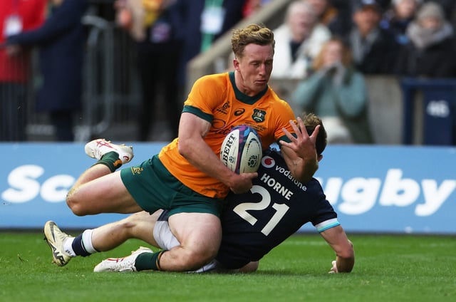 Rugby Union - Autumn Internationals - Scotland v Australia - Scottish Gas Murrayfield Stadium, Edinburgh, Scotland, Britain - November 24, 2024  Australia's Harry Potter scores a try REUTERS/Russell Cheyne/File Photo