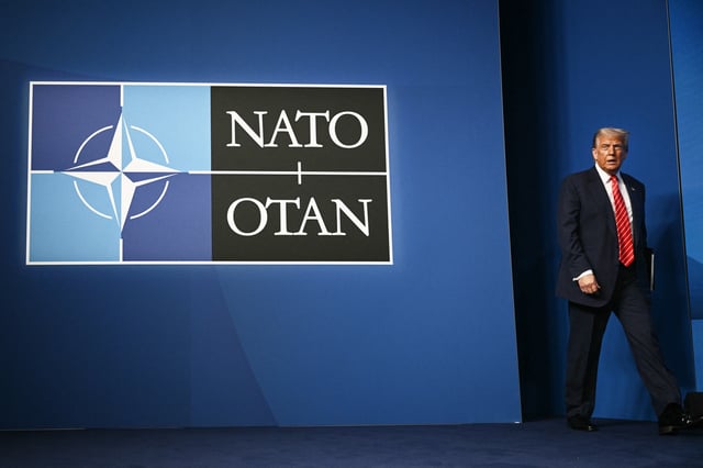 US President Donald Trump arrives for a press conference during a North Atlantic Treaty Organization (NATO) Heads of State and Government summit in The Hague on June 25, 2025.