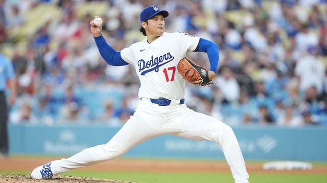 Aug 27, 2025; Los Angeles, California, USA; Los Angeles Dodgers starting pitcher Shohei Ohtani (17) delivers a pitch in the fifth inning against the Cincinnati Reds at Dodger Stadium. Mandatory Credit: Kirby Lee-Imagn Images