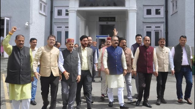 Leader of opposition Jairam Thakur along with BJP legislators staged a walkout from the Himachal Pradesh Vidhan Sabha during the monsoon session in Shimla on Thursday. (Deepak Sansta/HT)