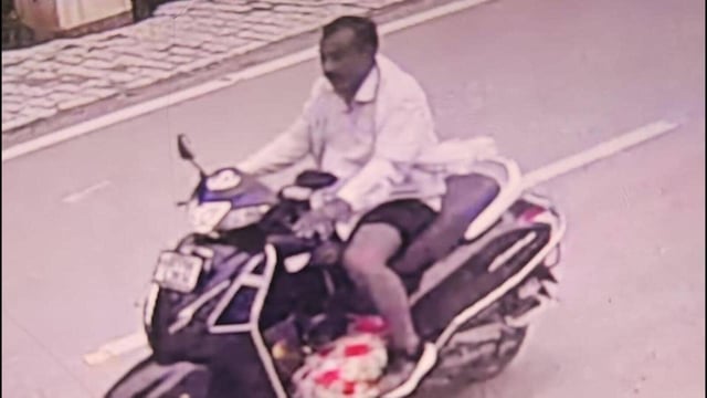 The accused, Sharan Singh, was caught on camera taking the torso of his nephew on his scooter. (Sourced)